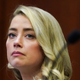 Image for article titled Amber Heard Has Already Lost in the Court of Public Opinion. Why?